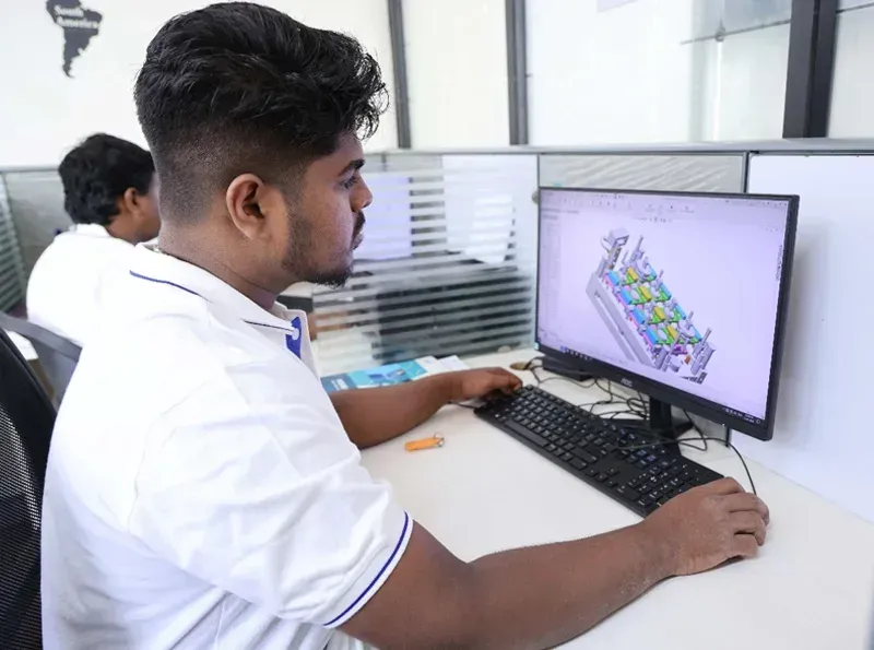 Designer working on a mold in CAD, Radiant Design Chennai