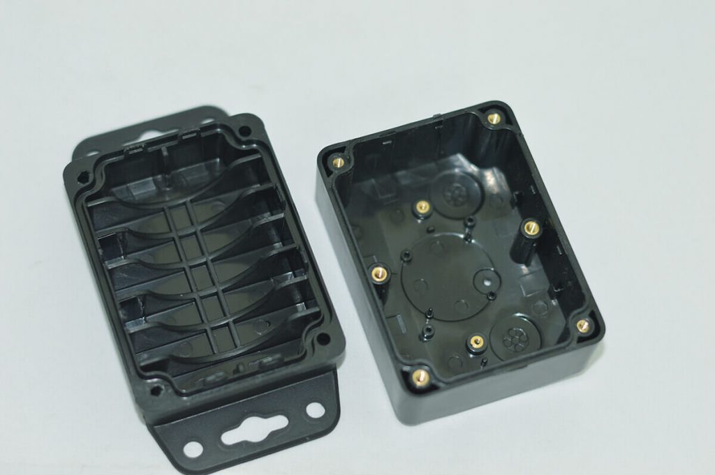 plastic enclosure with insert molding